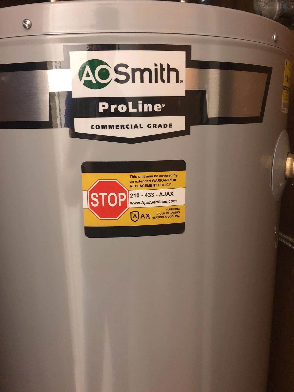 A.O. Smith ProLine water heater installed by Ajax with warranty sticker